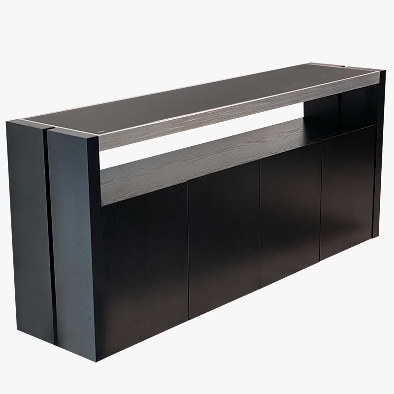 A sleek black console table featuring a glass top at Mobler Furniture in Edmonton, CA